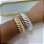 Bracelete Bijuteria Dourado e Prata Abaulado Espiral - Imagem 2