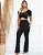 Calça Flare com Zíper e Bolsos Preta Lisa - Imagem 2
