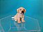 Miniatura de vinil Schleich de filhote Golden Retriever sentado 5 cm de comprimento e 3 cm de altura - Imagem 1