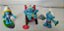 Trio de smurfs na praia, 5 e 5,5 cm Peyo/Jakks 2009, usados - Imagem 1