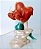 Miniatura Disney acetinada Ariel sentada numa rocha segurando uma concha, usada 7 cm - Imagem 4