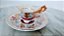Xicara e pires de porcelana (4 cm de diâmetro e altura e 8 cm de diâmetro) marca  desenho de flor de cerejeira - Imagem 1