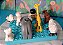 Lego duplo ; 7 animais variados 1 boneco do zoológico e placa de chão 12x8 pinos usados - Imagem 3