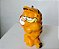 Miniatura de vinil gato Garfield segurando um despertador ,United Feature Syndicate 1991, 6,5 cm - Imagem 2