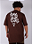 Camiseta Chronic Plus Size Colab. Mato Seco - Paz Amor E União - Marrom - Imagem 1