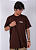 Camiseta Chronic - O Mundo é Cruel Mas Nóis é Cria - Marrom - Imagem 4