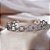 Pulseira Bracelete Com Elos Vazados e Microzircônias Ródio Branco - Imagem 1