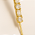 Piercing Transversal Com 7 Zircônias Banhado A Ouro - Imagem 3