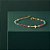 PULSEIRA RELIGIOSA COM CRUCIFIXO E ZIRCÔNIAS COLORIDAS BANHADA A OURO 18K - Imagem 2