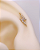 Piercing Labret com Raio de Zircônias - Ouro 14k - Imagem 2