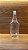 300 UN. GARRAFA PET GROWLER 1 LITRO TRANSPARENTE COM TAMPA - Imagem 2