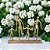 ESCULTURA FAMILIA EM ALUMINIO E MADEIRA DOURADO - 31cm - Imagem 3