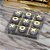 JOGO DE TABULEIRO DECORATIVO EM MARMORE CINZA E DOURADO - Imagem 2