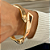 Bracelete Geométrico Torcido Banhado a Ouro 18k - Imagem 1