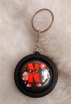 Botton Giratório com Chaveiro Netflix
