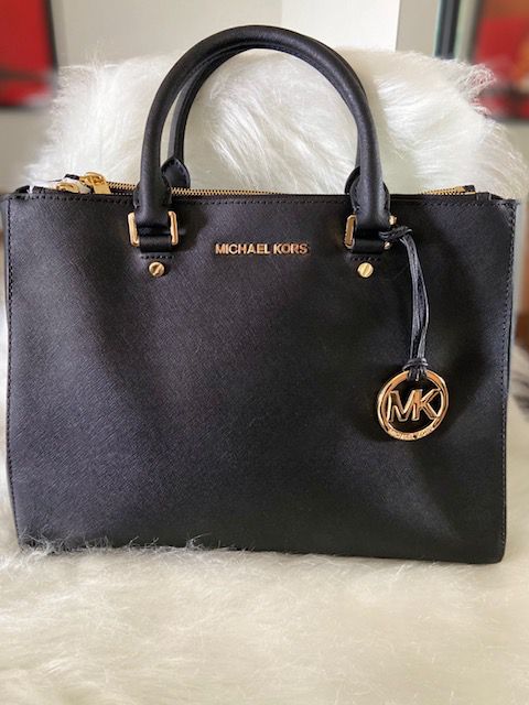 michael kors beauty bolsa