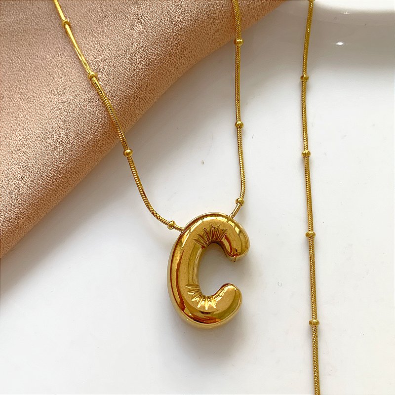 COLAR LETRA BUBBLE A-D DOURADO AÇO 316L⭐️