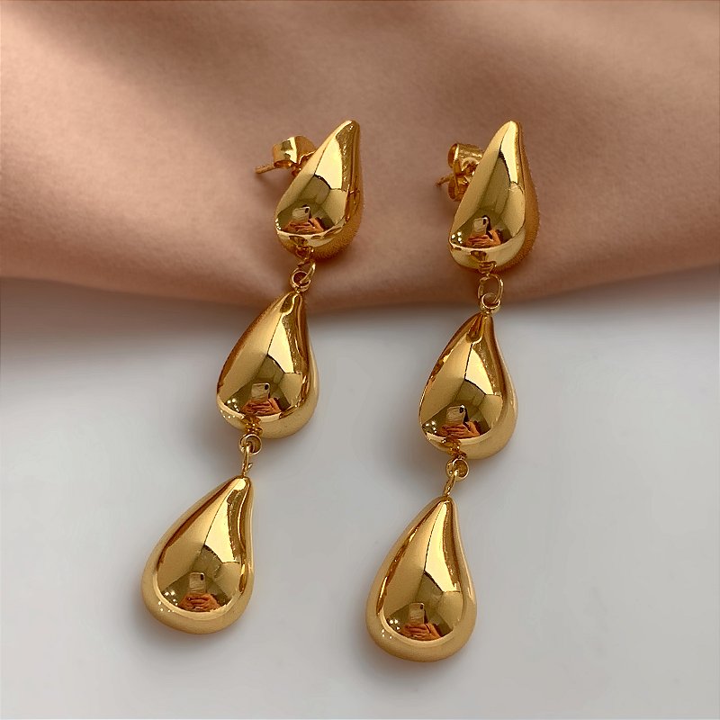 BRINCO VÍRGULAS LISAS DOURADO AÇO 316L⭐️