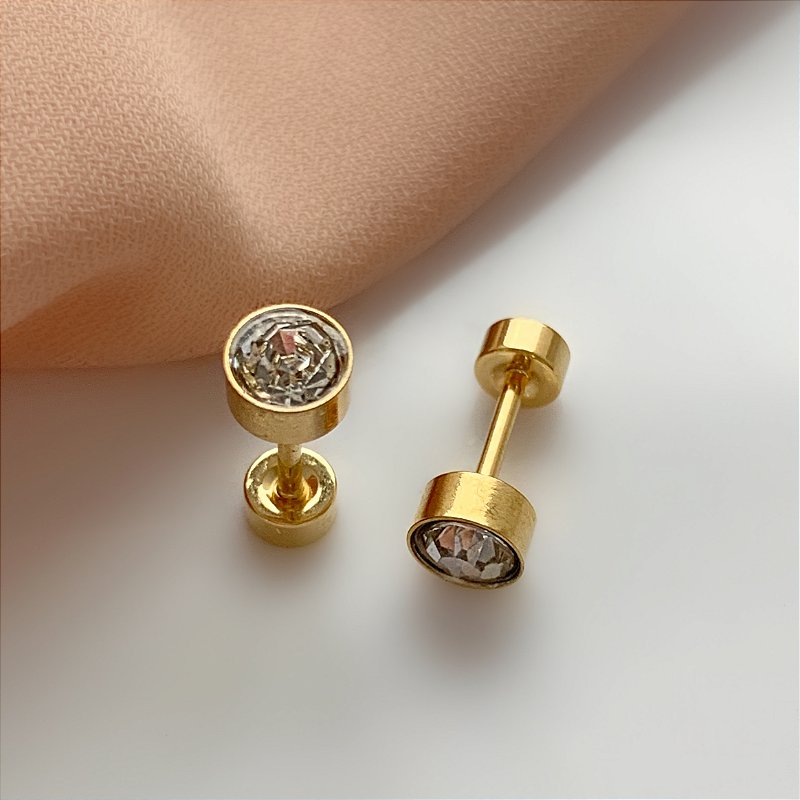 BRINCO PONTO DE LUZ ZIRCÔNIA TARRAXA ROSCA DOURADO AÇO 316L⭐️