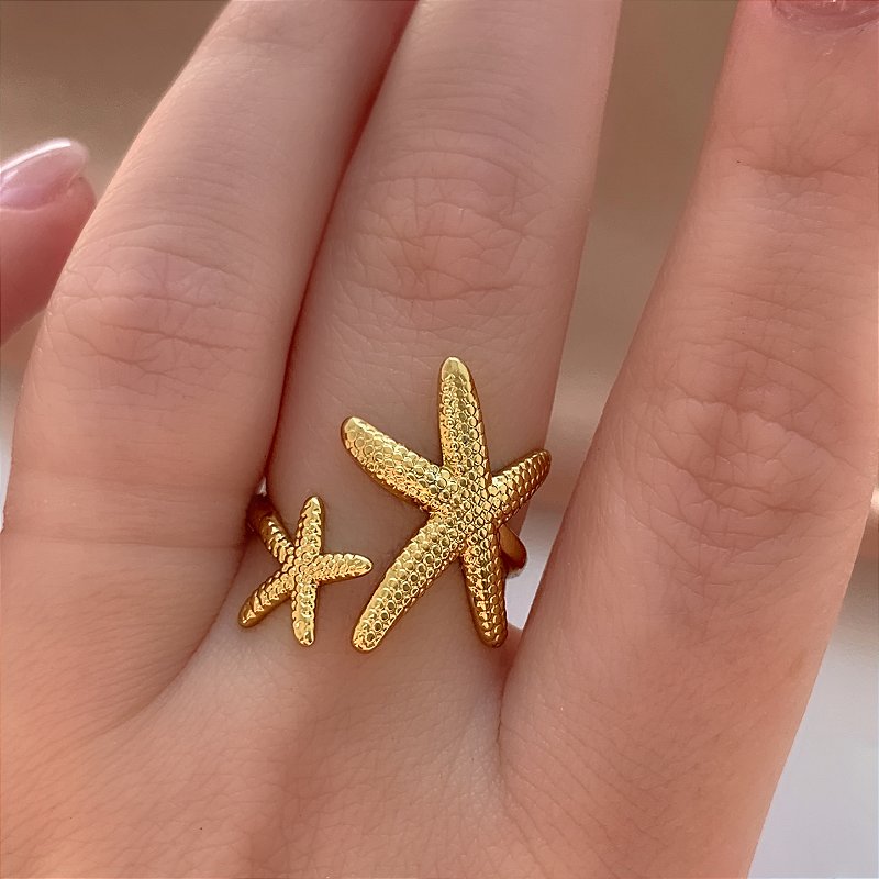 ANEL REGULÁVEL ESTRELAS DO MAR TEXTURIZADAS DOURADO AÇO 316L⭐️