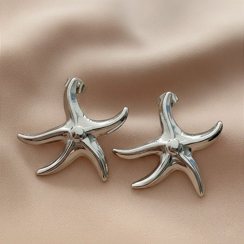 BRINCO ESTRELA DO MAR LISA CURVA AÇO 316L⭐️