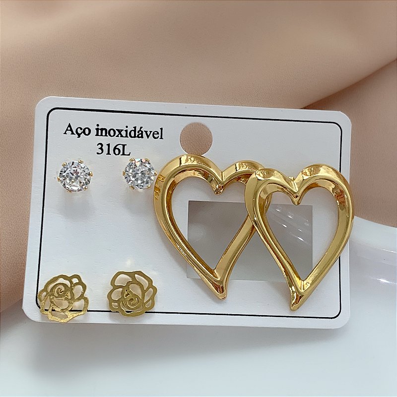 BRINCO KIT CORAÇÃO E FLOR DOURADO AÇO 316L⭐️