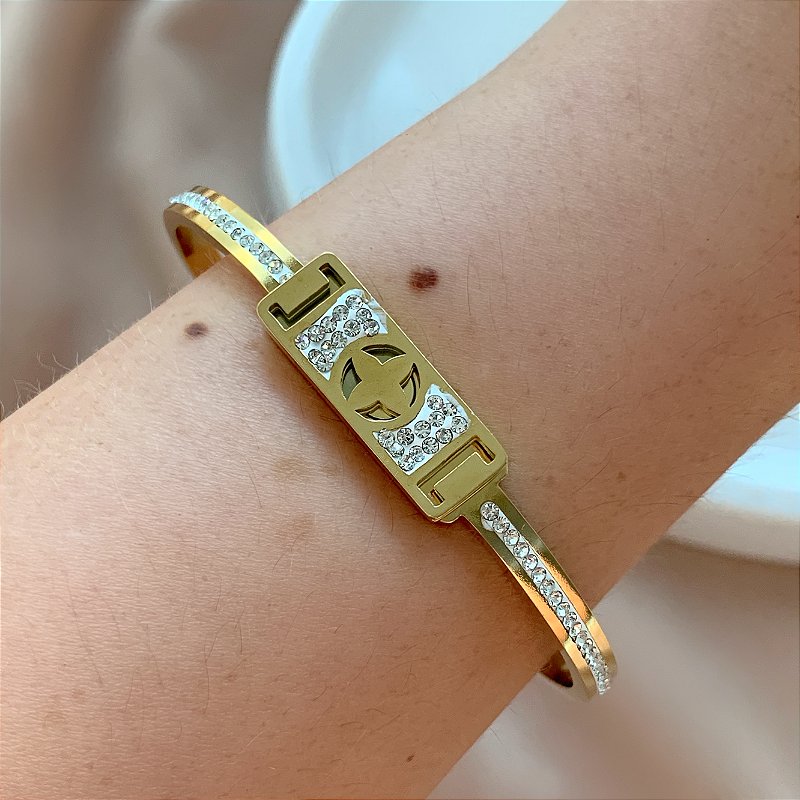 PULSEIRA / BRACELETE DETALHE RETANGULR ZIRCÔNIAS TREVO LISO DOURADO AÇO 316L⭐️