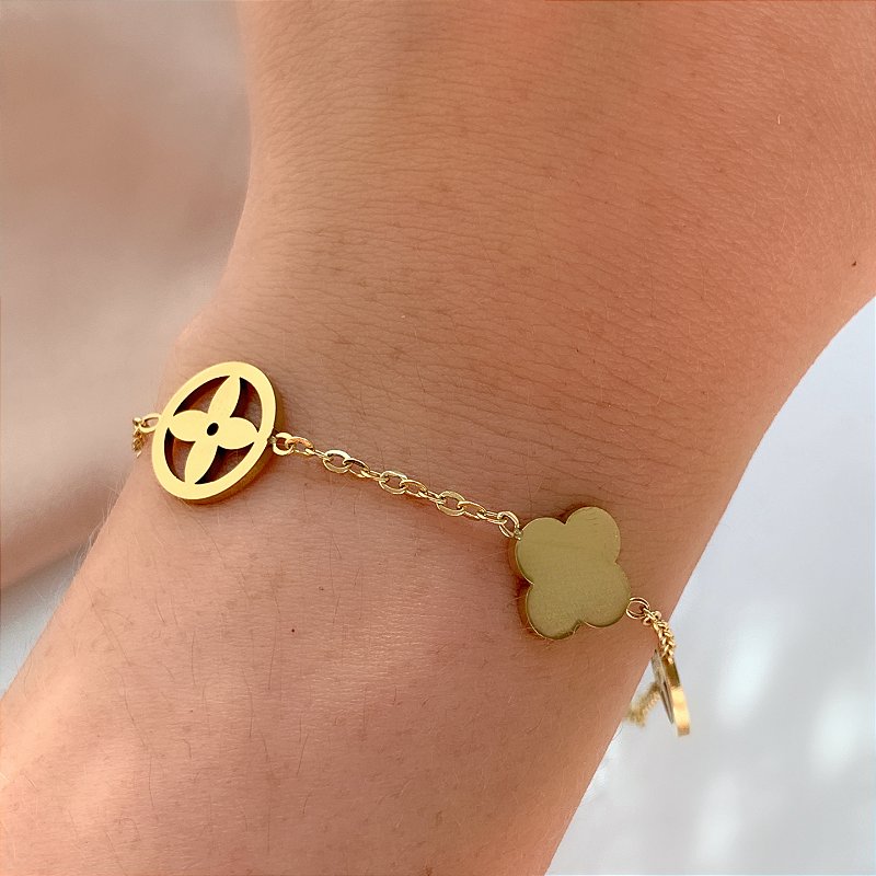 PULSEIRA TREVOS DIFERENTES DOURADO AÇO 316L⭐️