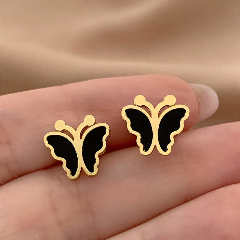 BRINCO BORBOLETA RESINADA PRETA BORDA DOURADO AÇO 316L⭐️