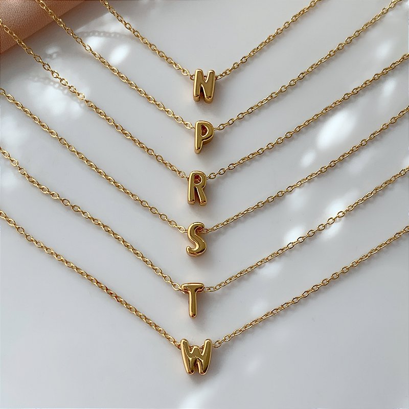 COLAR PINGENTE LETRA DELICADA N-W DOURADO AÇO 316L⭐️