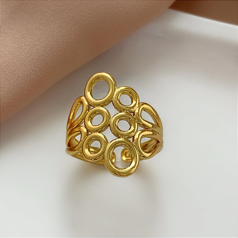 ANEL REGULÁVEL BOLINHAS VAZADAS DOURADO AÇO 316L⭐️