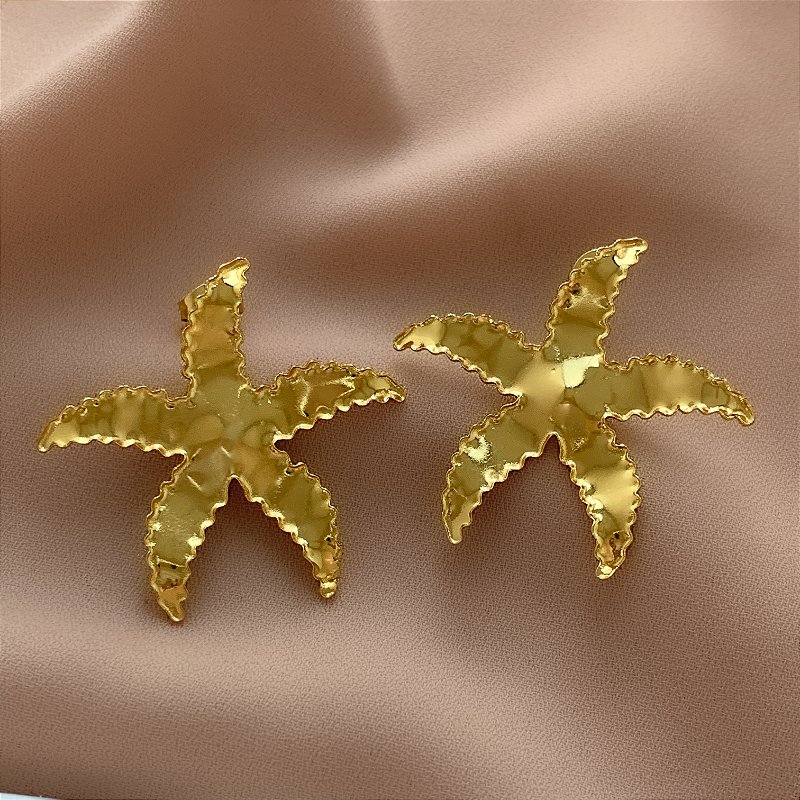 BRINCO ESTRELA DO MAR BORDA FRANZIDA DOURADO AÇO 316L⭐️