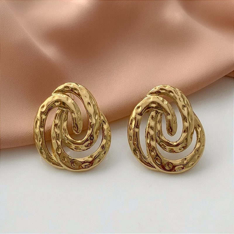 BRINCO LINHAS ENROLADAS DOURADO AÇO 316L⭐️