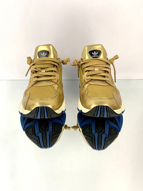 Adidas torsion preto e dourado cheap