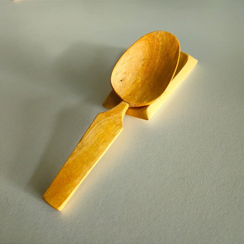 conjunto colher de comer e suporte