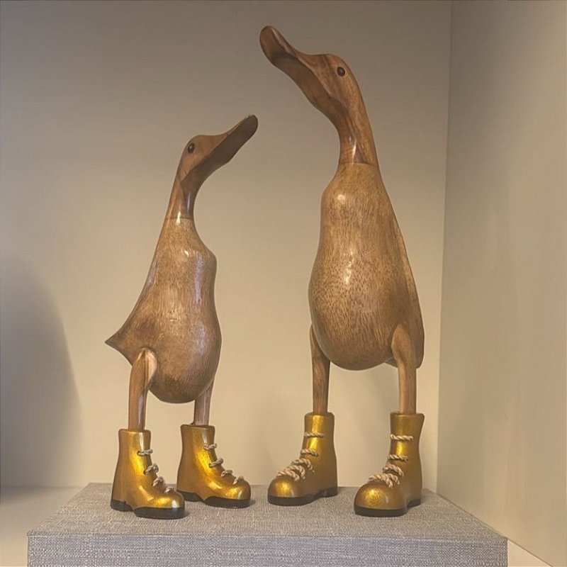 Pato de Botas Douradas