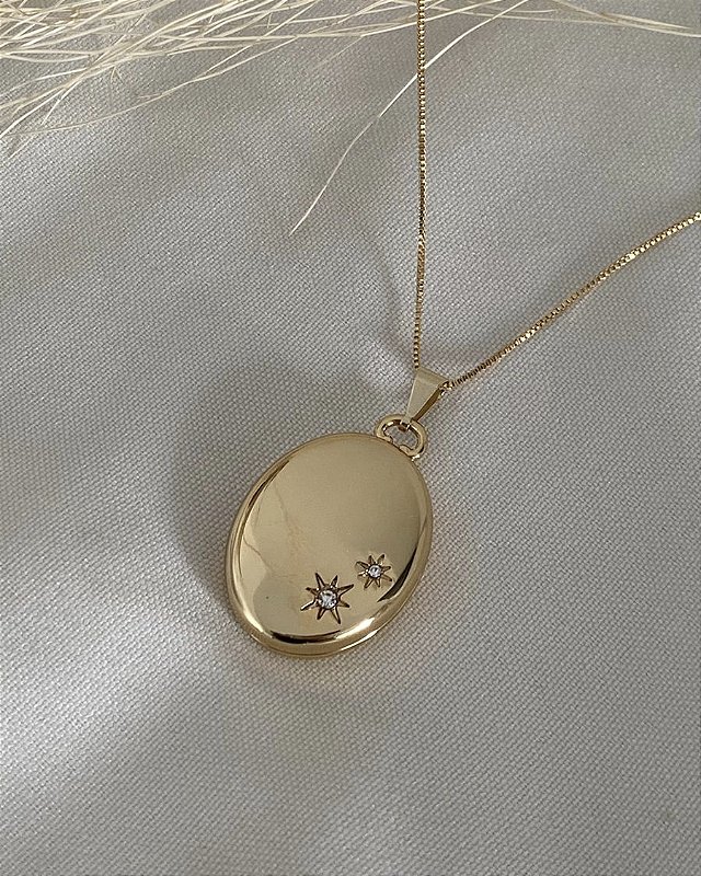 Relicário oval estrelas DOURADO