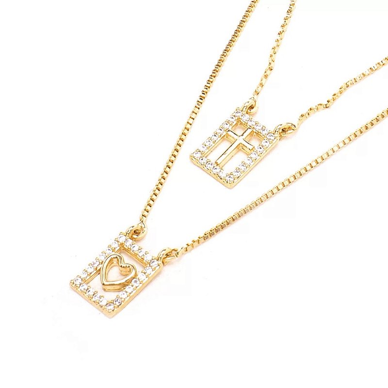 Colar escapulário cruz e coração vazado micro zircônia folheado em ouro 18k