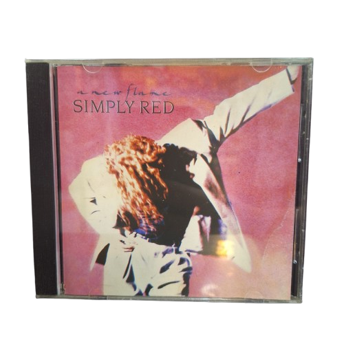 CD – Simply Red – A New Flame - Onde cada item conta uma história