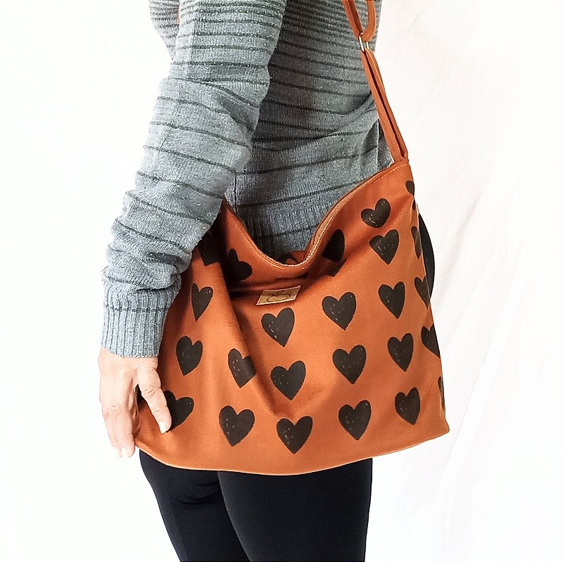Bolsa lateral corações