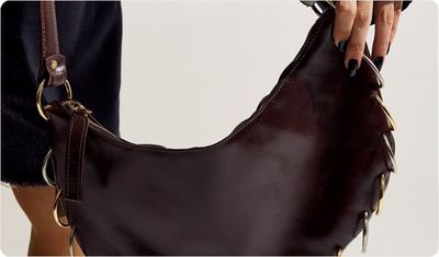 Bolsa Feminina Ombro Argolas Couro Kuromi Marrom