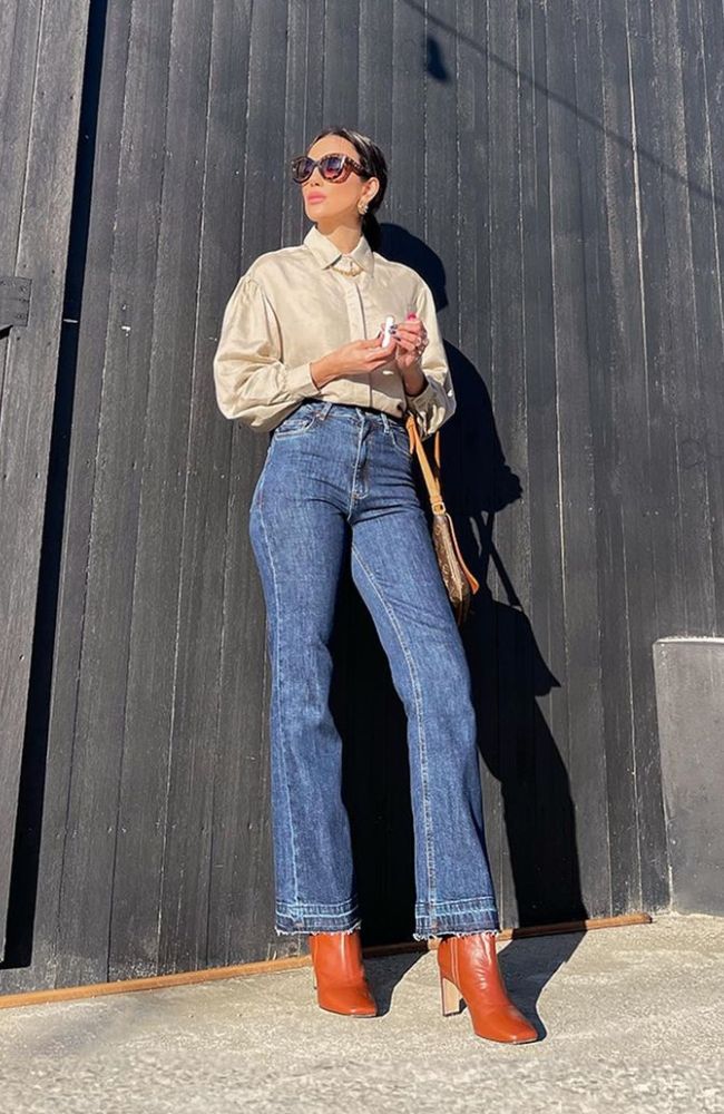 Look Chique com Jeans e Bota Cano Curto